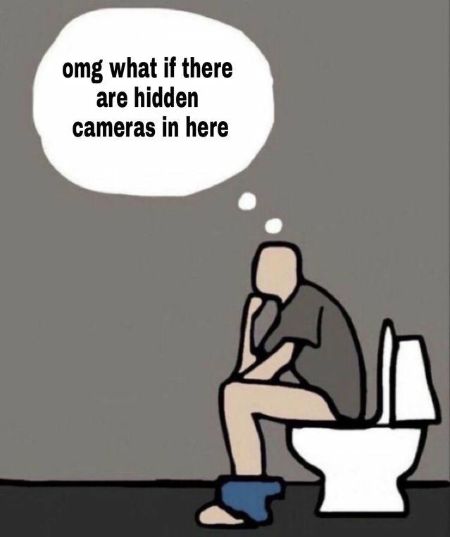 Man On Toilet Worries About Hidden Cameras